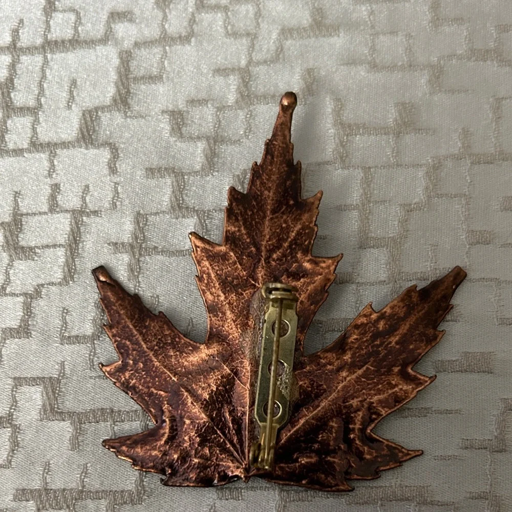 Copper tone Leaf and Silver telephone pins. Origin unknown, very pretty